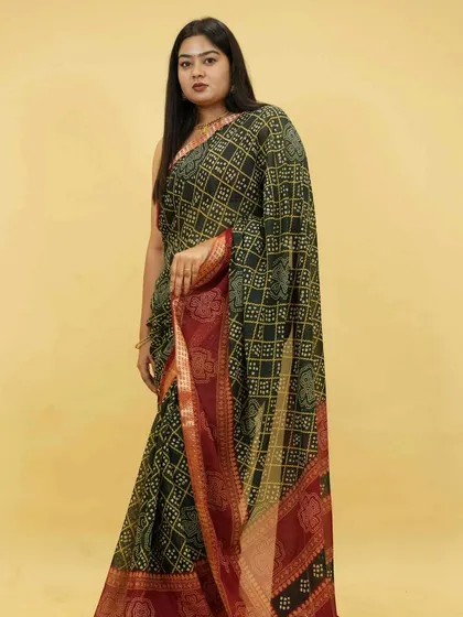 My ready-to-wear sarees are designed to fit and flatter every body type. This plus-size model is wearing a traditional Bandhani print saree, showing how you can enjoy timeless Indian styles without any fuss.