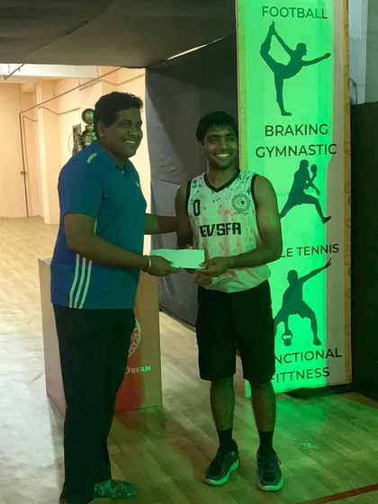 Coach Rohit receiving his award, a testament to his skill, discipline, and passion for the game.
