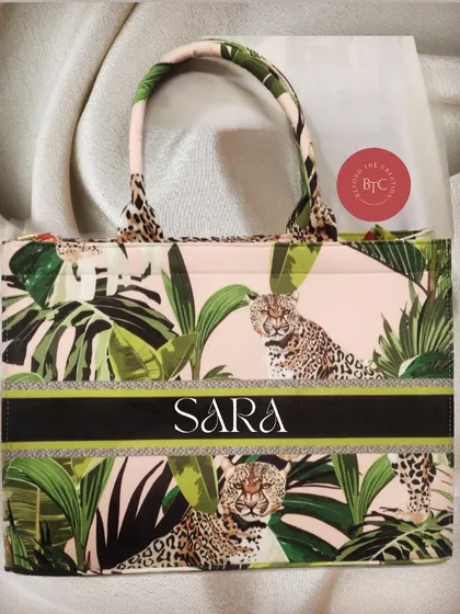 A bold and beautiful pink leopard print tote bag, personalised for 'Sara'. The quality of the suede velvet and the print is exceptional.