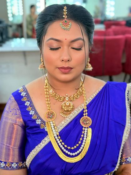 My gorgeous bride to be, all set for her engagement. We chose a soft, elegant makeup look with defined eyes and a neutral lip to complement her royal blue saree.