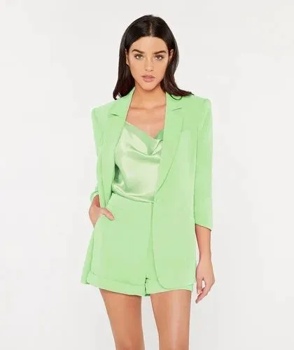A fresh and fun co-ord set for summer, this mint green blazer and shorts combination is perfect for a smart-casual dress code.