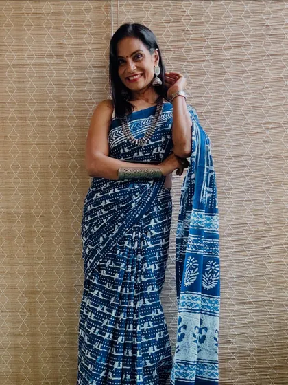 Another classic indigo print cotton Mulmul saree. The deep blue color and intricate print make it a very sophisticated choice for everyday wear.