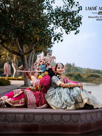 A peaceful portrait of Radha and Krishna by the water. This student-led project showcases their ability to create character makeup that is both authentic and artistic.