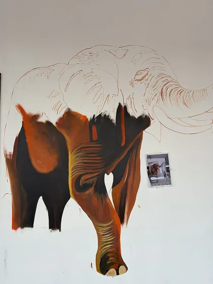 The early stages of painting the elephant, blocking in the dark shadows and warm highlights.