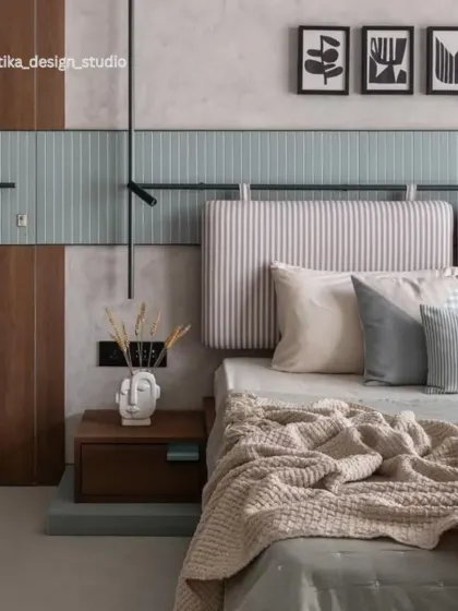I designed this bedroom with a focus on soft textures and a modern Scandinavian aesthetic. This close-up shows the combination of a striped upholstered headboard, a mint green tiled accent wall, and warm wood paneling, creating a space that feels both calm and visually interesting.