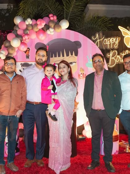 Capturing all your guests is important. Here is a lovely group photograph of the family and friends who came to celebrate the birthday girl's special day.