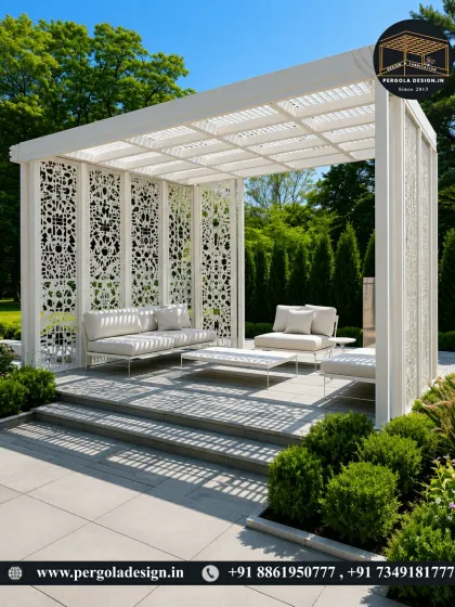 This all-white pergola is a statement of modern elegance. The laser-cut privacy screens feature an intricate pattern, creating a semi-enclosed space that feels both open and intimate, perfect for a chic garden lounge.