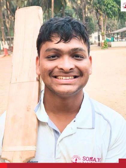 Nirmit Mandkulkar, Player of the Match, holds his bat after a strong all-round performance of 72 runs and 1 wicket.
