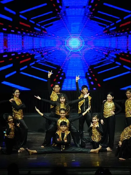 Our little legends striking a final pose after their fiery hip hop performance.