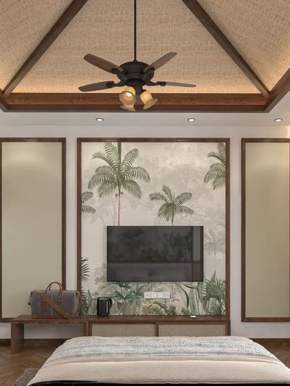 In this bedroom, the television is integrated into a feature wall with a nature-inspired mural. This design choice ensures that the technology doesn't dominate the room, maintaining a peaceful and uncluttered atmosphere.