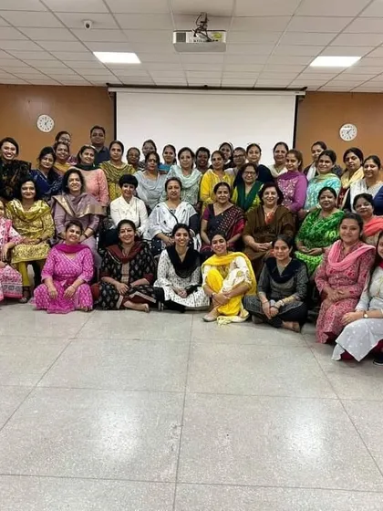 A group photo with all the amazing teachers after our wellness session. It's wonderful to see so many women committed to their health.