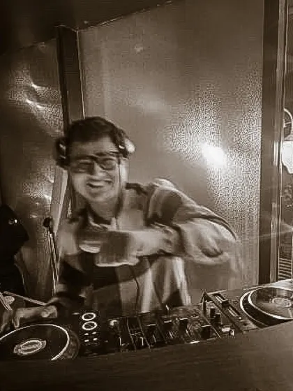A sepia-toned shot capturing a moment of pure fun and connection with the music and the crowd.