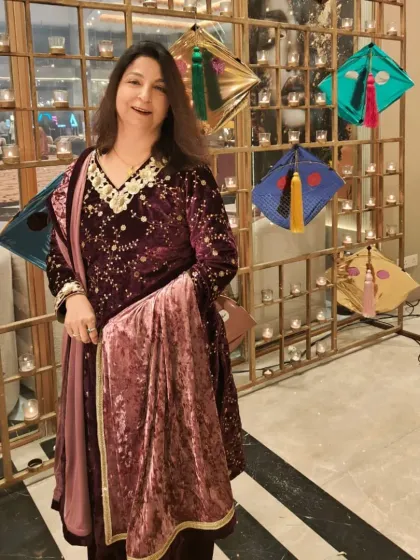 My lovely client celebrating Lohri in her custom-made velvet suit. The rich fabric and embroidery make it perfect for a winter festival.