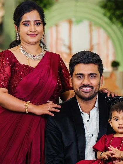 A lovely family portrait from Tashvi's woodland-themed birthday celebration.