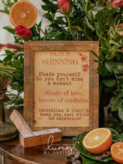 Another perspective of the "Sun's Shinning" station, with a beautiful arrangement of flowers and oranges.