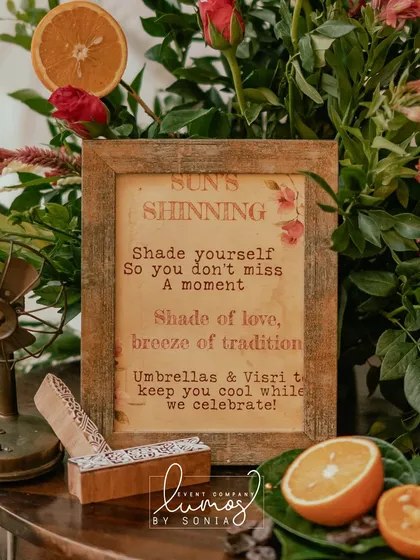 Another perspective of the "Sun's Shinning" station, with a beautiful arrangement of flowers and oranges.