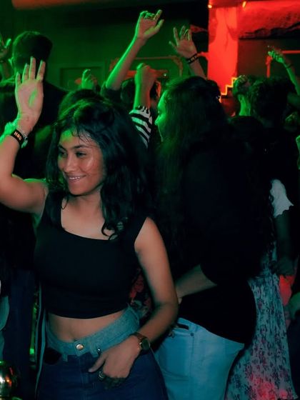 The dance floor at H.O.D Club is always full of energy. This shot captures the pure joy of people dancing without a care in the world.