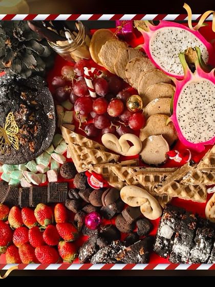 Another view of our indulgent fondue setup, this time with a focus on sweet dippables. Waffles, pretzels, fruits, and marshmallows make this a fun and interactive dessert experience for everyone.