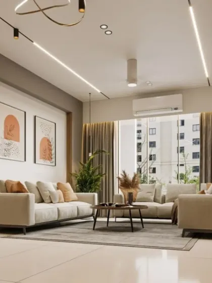 We use strategic lighting to enhance our living room designs. This space features track lighting and linear LEDs to create a modern and gallery-like feel, highlighting the minimalist decor.