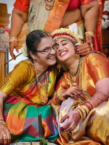 A heartfelt, candid moment between a bride and her mother during a Konkani wedding. For us, wedding photography is also about the precious bonds of family.