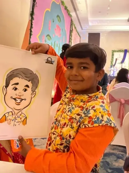 Another happy young customer with his colorful caricature, a perfect keepsake from a fun day.