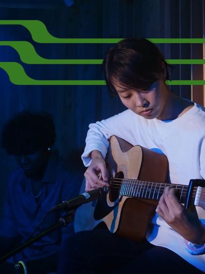 A guitarist focused on her fingerstyle playing. Our Intramurals are a great opportunity to showcase specific techniques and skills learned in lessons.