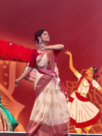 A full-length view of my performance at the college fest in Mumbai. The flow of the saree and the posture reflect the core aesthetics of Kathak that I strive to embody, a teaching from my gurus.