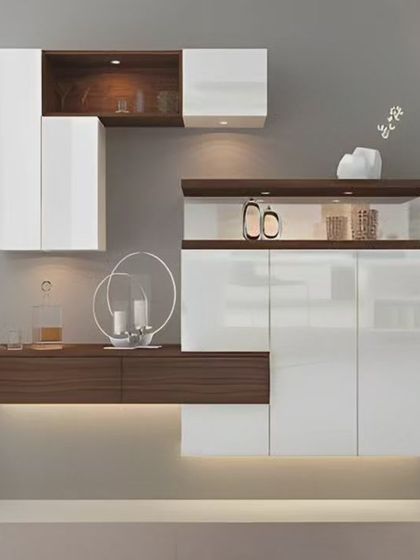 A floating crockery unit with a clean, modern design. The combination of white and wood-look cabinets creates a light and airy feel, perfect for a contemporary dining space.