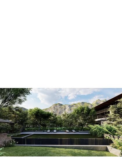 A rendering of the family commune, showing how the homes are nestled at the foot of a hill, with a shared pool and landscape creating a space of collective living.
