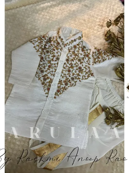 The full view of the handcrafted Jubba and Kacche. It's a perfect outfit for a little one for any traditional function.