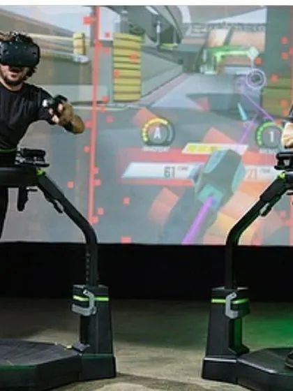 A clear shot of the Virtuix Omni installation, showcasing the safety harness and ring that allows users to move freely and safely within the virtual environment.