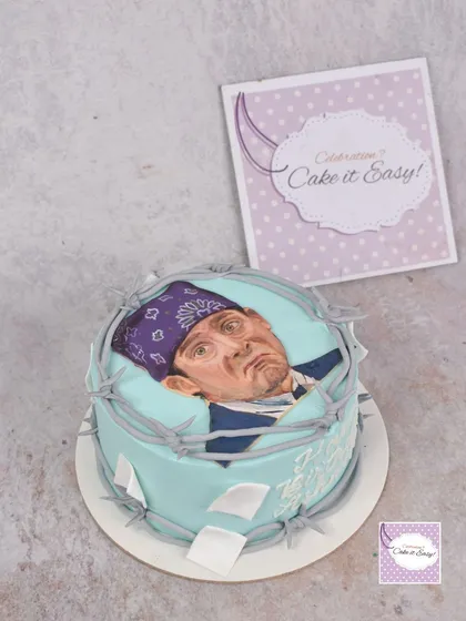 This is for all the fans of 'The Office'. I hand-painted this portrait of Prison Mike on a sheet of fondant. I love painting because it allows for a level of detail and expression that’s very personal. It’s like therapy for me, and the result is a truly unique piece of edible art.