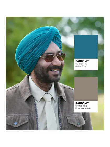 My process is deeply rooted in color theory. For Ajay Devgn's character Jassi, we used specific Pantone shades like 'Beetle Wing' and 'Roasted Cashew' to create a unique and memorable visual identity. This level of detail in menswear styling helps define the character's personality and his journey in the film.