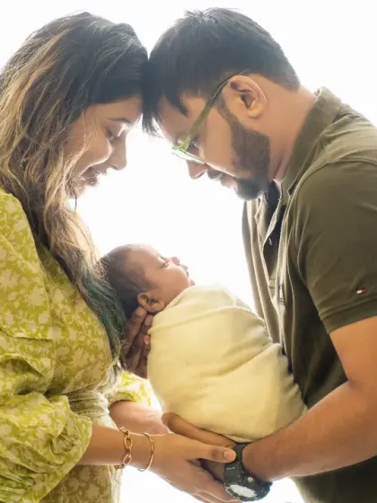 The quiet connection between new parents and their baby is pure magic. We use soft, natural light to create timeless, emotional portraits that you will cherish forever.
