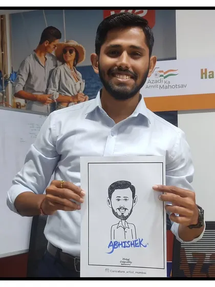 An employee from VIP Bags with his caricature during a corporate event. It's a fun way to make staff feel appreciated.