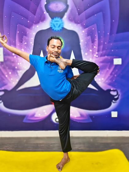 A standing balance pose that challenges stability and opens the hips.