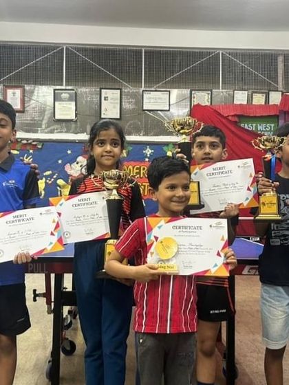 A group of our tournament winners, holding their certificates and trophies with pride. This image captures the spirit of achievement that runs deep in our academy.