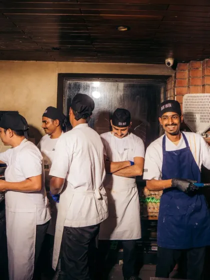 Our kitchen crew, the backbone of Brik Oven, taking a moment during a busy service. Their hard work and camaraderie are what make it all possible.