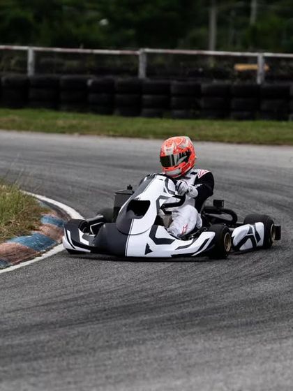 Our driver in the black and white kart during the RMC Asia Trophy.