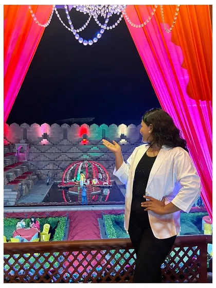 As a Marathi mulgi in business, I put my heart into every event. Here I am, overseeing the final setup, making sure every detail is perfect for my client's big day.