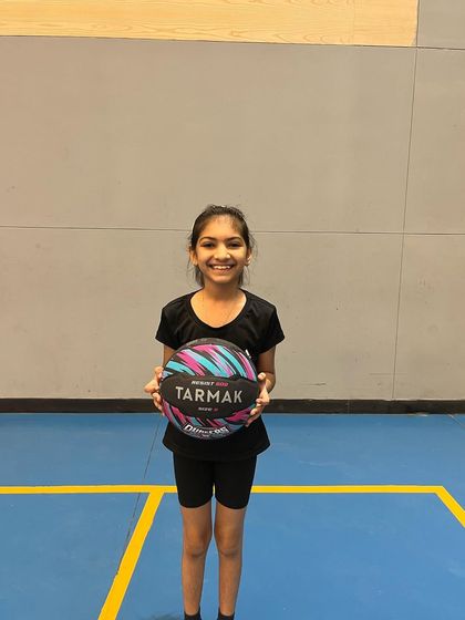 Another smiling face from our summer camp. We provide a great environment for kids to spend their summer learning and playing basketball.