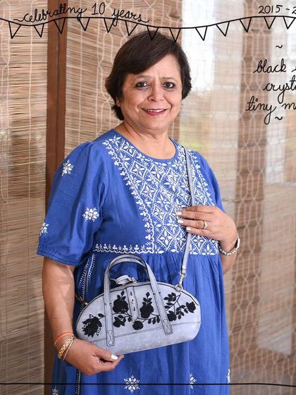 Our patron model Meera Sain carrying the Black Lace Crystal Tiny Mandy as a crossbody bag.