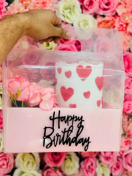 Another look at my birthday hamper, this time with a lovely heart-themed cake. You can pick any cake design and flavour to make it truly personal.