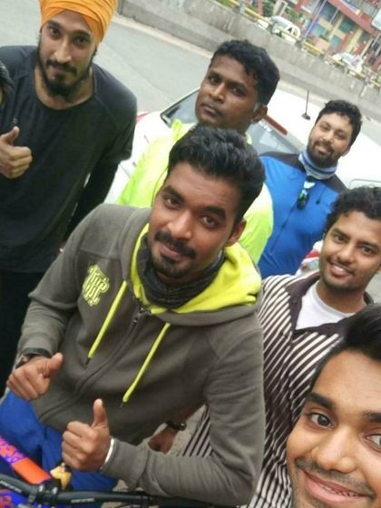 Thumbs up from the crew! A happy, candid moment that shows the positive vibe of our rides.