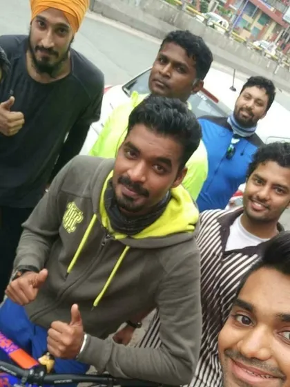 Thumbs up from the crew! A happy, candid moment that shows the positive vibe of our rides.
