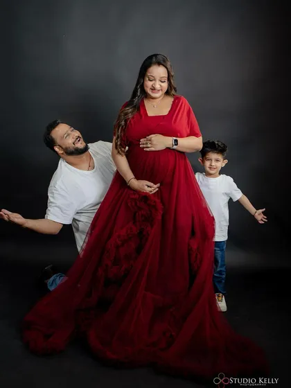 A fun and heartwarming family shot from the maternity session. The makeup is natural and pretty, perfect for capturing these precious family moments.