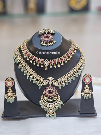 A beautiful AD set with ruby and mint green stones, perfect for a bride or bridesmaid.