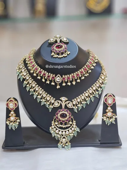 A beautiful AD set with ruby and mint green stones, perfect for a bride or bridesmaid.