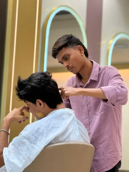 A great haircut can boost your confidence. This client is getting a fresh new style from one of our talented team members.