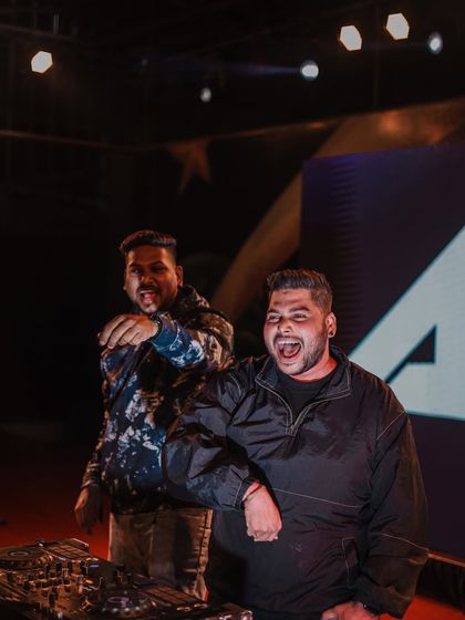 Hyping up the crowd at 'Illusia' fest. My performance is interactive, I'm right there with the audience, feeling the energy.